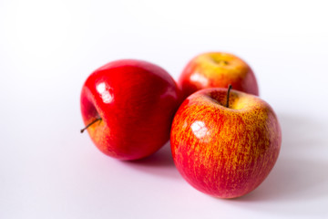 red apples on white background