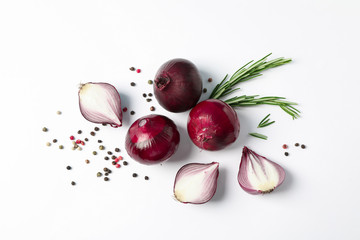Flat lay composition with red onion and spices on white background