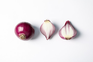 Flat lay composition with red onion on white background