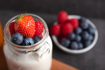 yogurt with fruit on a breakfast table top view