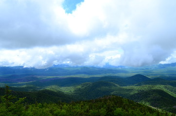 Naklejka premium landscape with mountains and clouds