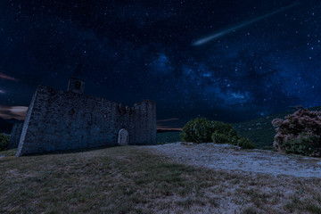 Perseid MEteor Shower over  Trinity Church in Hrastovlje, Slovenia