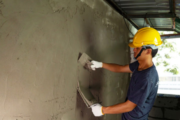 Plastering in wall plastering in the building