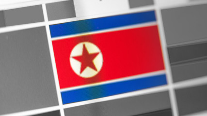 North Korea national flag of country. North Korea flag on the display, a digital moire effect.