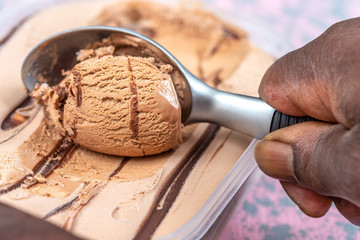 Chocolate ice cream. Creamy, melt.Chocolate ice cream scoop.Closeup. top view