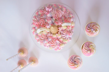 Fototapeta na wymiar tasty cake and cupcakes for kids, birthday