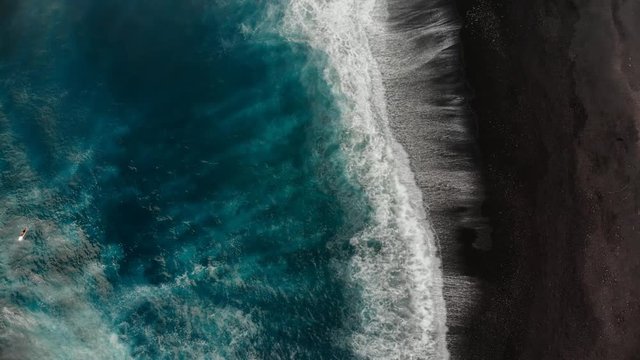 animated photograph of surfer at Isaac hale park.  wave breaking on beautiful black sand break