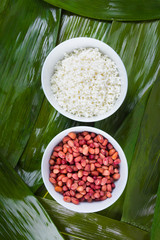 The ingredients of zongzi in the background of wood grain