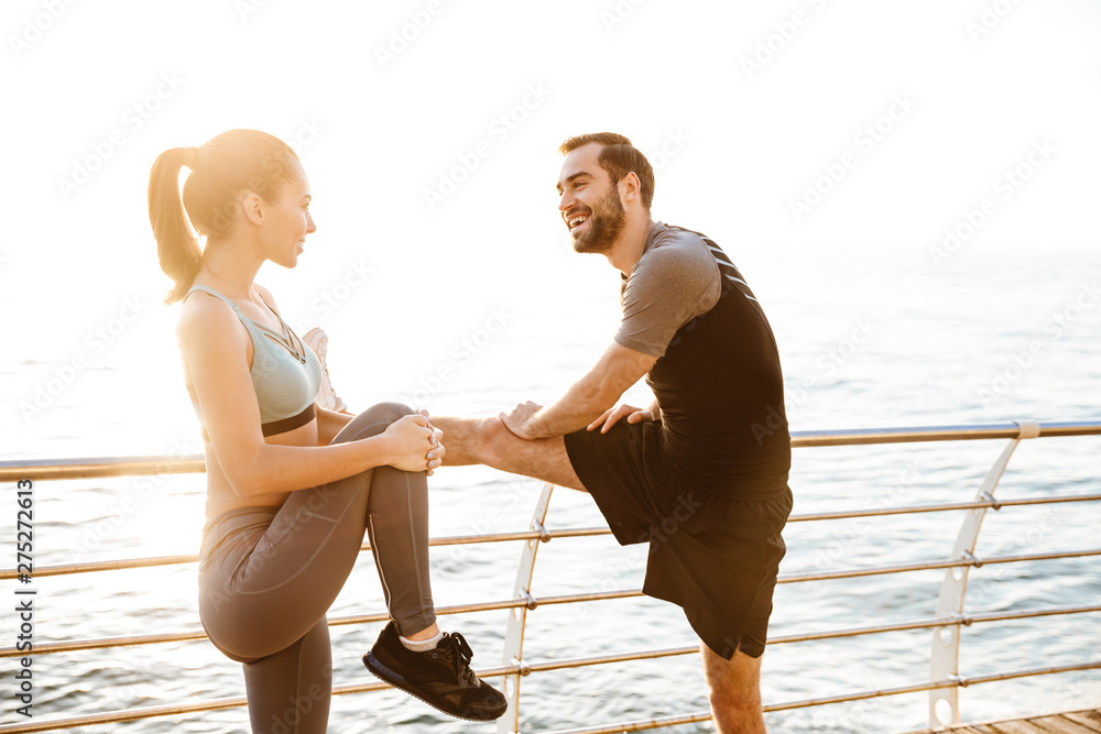 Sticker Attractive sporty young fitness couple