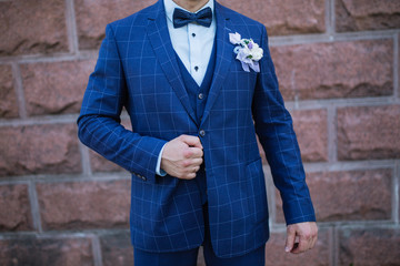 Obraz premium blue jacket in the box. groom. portrait of young man