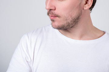 Fototapeta premium Handsome man with stubble or beard on face close up