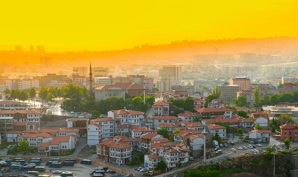 Traditional Turkish houses with Haci Bayram mosque in sunset