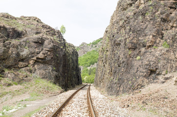 Railway dug into the rocks n the mountain in Bulgaria