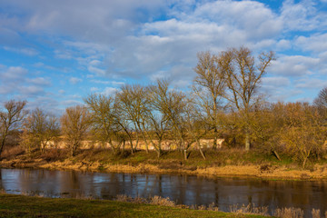 Picturesque autumn landscape in blue and yellow colors in the Brest Fortress, Belarus