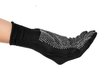 Hand in black glove for work on a ziolated white background. Gesture to accept.