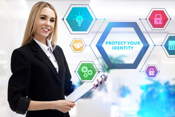 The concept of business, technology, the Internet and the network. A young entrepreneur working on a virtual screen of the future and sees the inscription: Protect your identity