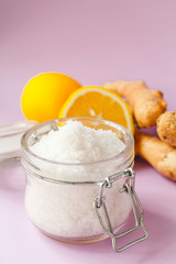 Scrub. Sea salt. Lemon. Ginger. Pink background