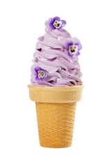 Soft fruit ice cream  in a waffle cup with flowers viola