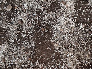 Glass shards on the floor. Background of broken window