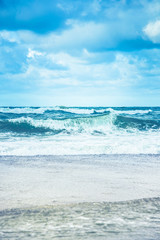 Fototapeta na wymiar Blue Ocean with waves and clear blue sky