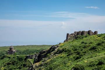 Fototapeta premium Fortress in the clouds , Amberd , Armenia. Armenian landscape , Armenian Highlands