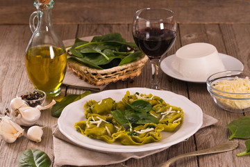 Spinach ravioli with ricotta cheese filling.
