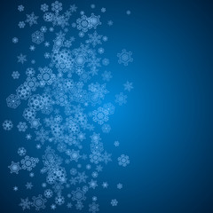New Year snowflakes on blue background with sparkles. Winter theme. Christmas and New Year snowflakes falling. For season sales, special offer, banners, cards, party invites, flyer. White frosty snow