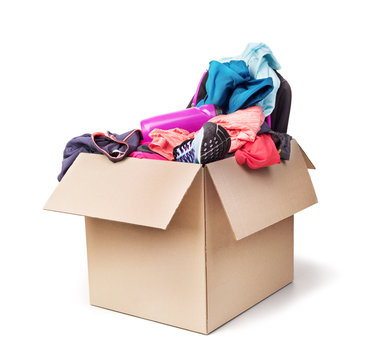 Donation box with clothes isolated on a white background