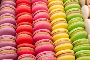 Delicious colored macaroons in an assortment on a white background