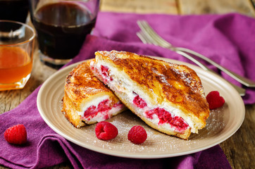 Ricotta raspberry stuffed French Toasts with fresh raspberries