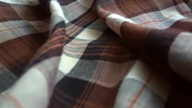 Checkered texture. Plaid material. Close-up. Can be used as a background.