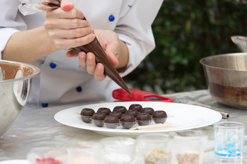 Chef making chocolate; selective focus