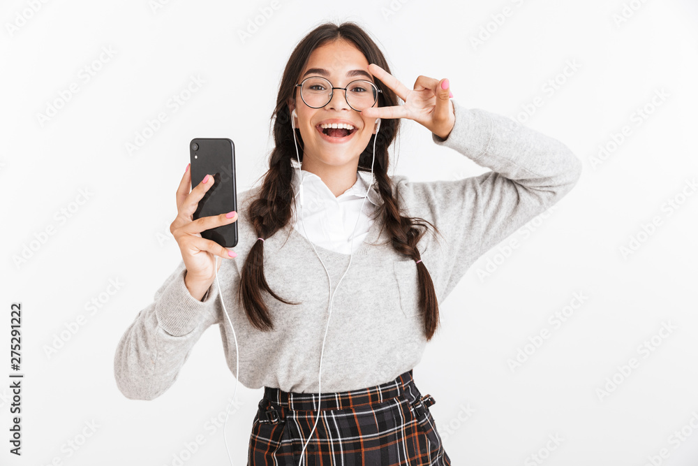 Sticker Attractive schoolgirl wearing unifrom standing