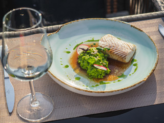 Grilled salmon fillet fish meat with bean puree