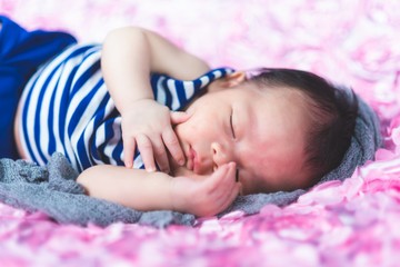 sleeping newborn baby on a blanket, baby asia