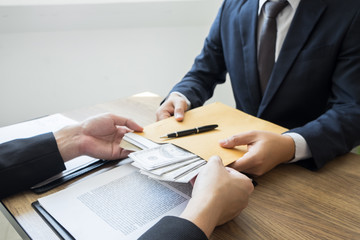 bribe and corruption concept, Corrupted businessman sealing the deal hand receiving venality bribe...