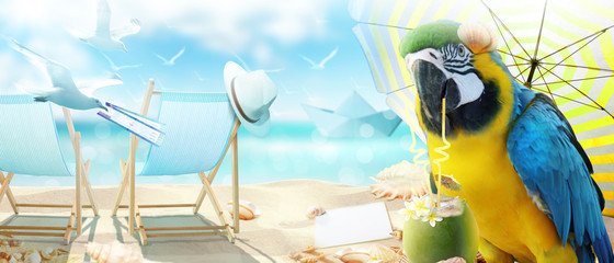 Papagei mit Cocktail im Urlaub am Strand © Thaut Images