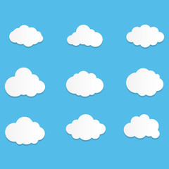Set of Cloud Icons with flat style in blue sky background. Copy space. Speech Bubble, White blank hanging..