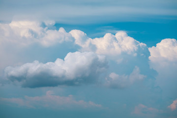 white heap cloud and tiny blue clear sky
