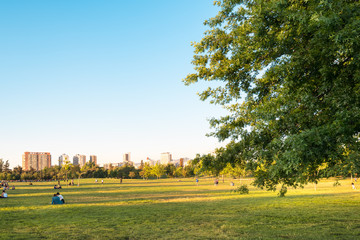 Santiago, Region Metropolitana, Chile - People enjoying a summer evening in Parque O’Higgins at downtown.