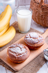 Homemade banana muffins on the wooden table