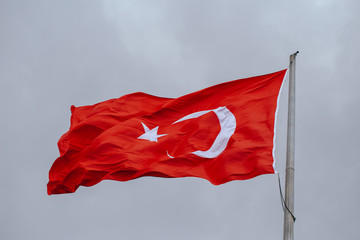 Turkey flag waving on the wind in the evening
