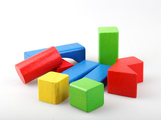 Studio Shot Of Colorful Toy Blocks Against White Background