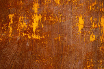 Worn vintage brown orange grunge wood grain background texture