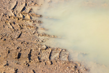 Wheel track on mud background and texture