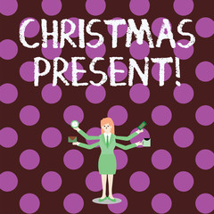 Word writing text Christmas Present. Business photo showcasing presented as a gift given in celebration of Christmas Businesswoman with Four Arms Extending Sideways Holding Workers Needed Item
