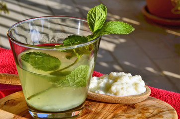 Water kefir drink with fresh mint leaves