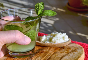 A kefir drink with mint leaves