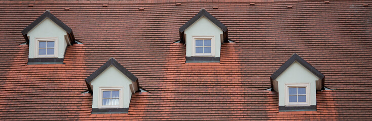 Small dormers on big roof