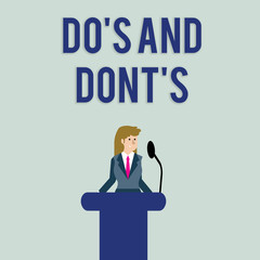 Text sign showing Do S Is And Dont S Is. Business photo text advising Rules or customs concerning some activity Businesswoman Standing Behind Podium Rostrum Speaking on Wireless Microphone